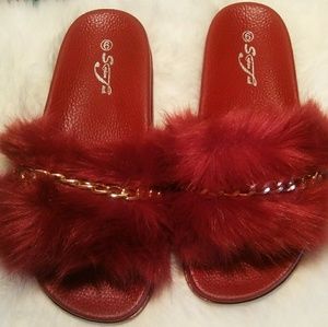 Red fur and gold sandal slides